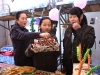 Students of Tibetan ethnic group enjoy traditional food on the first day of Tibetan new year at Liaoyang First High School in north China's Liaoning Province on Feb. 25, 2009. Tibetans across China are celebrating the 50th Tibetan New Year after the Democratic Reform with their old traditions. 